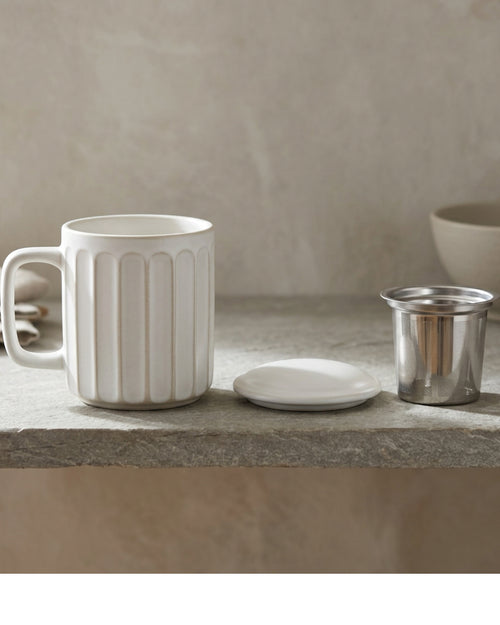 Ymvbf Ribbed Cylinder Ceramic Tea Cup with Slot Infuser and Lid 13 oz Clay Oat - Lifestyle view